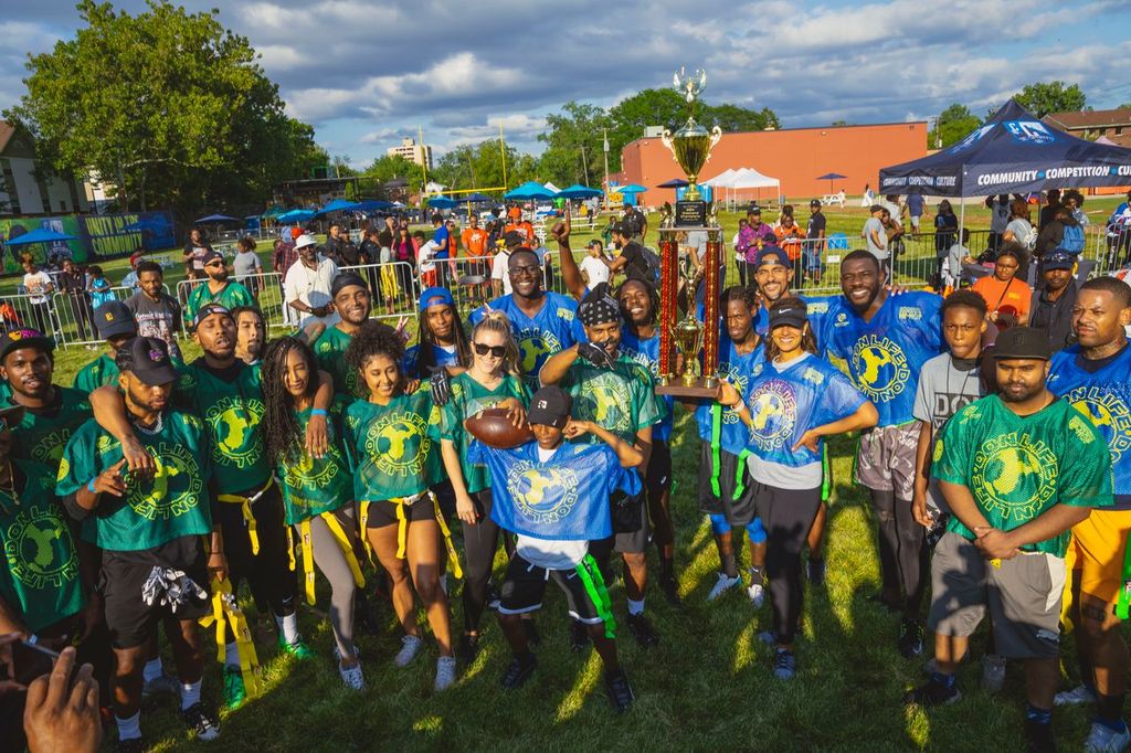 Flag football team with trophy